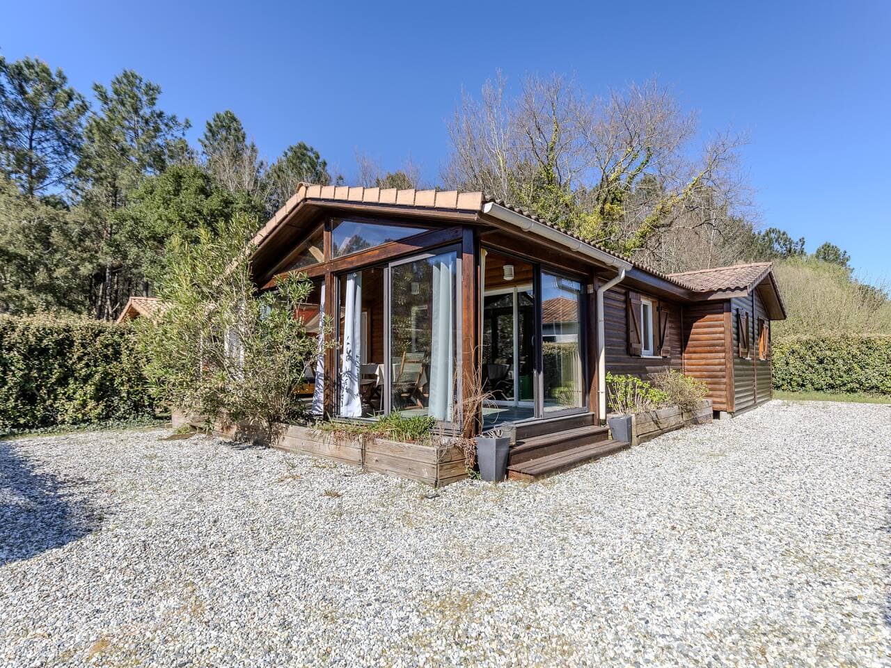 Chalet au cœur de la pinède, location de vacances à Saubion
